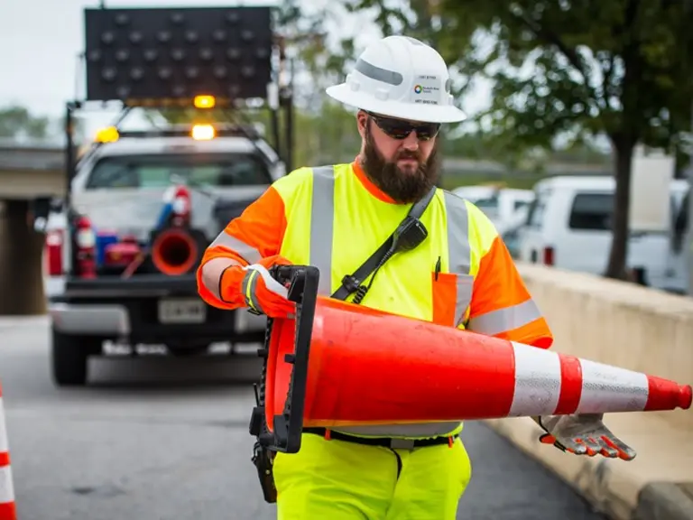 Man at work with safety dispositive
